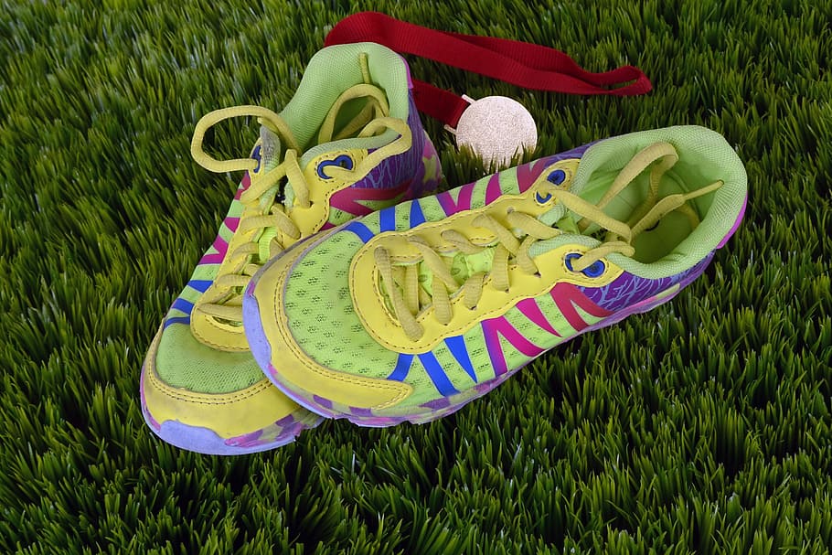 pair of green-and-pink athletic shoes on green grass, running shoes, race, sport, run, jog, shoes, sports shoes, shoelaces, lacing, endurance, jogging shoes, jogging, fit, foot, competition, condition, speed, running track, neon yellow, colorful, medal, gold, rush, HD wallpaper