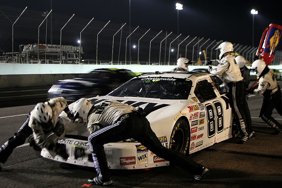 people repairing white stock car during nighttime, pit crew, pit stop, nascar, tires, gasoline, auto racing, car, speed, racetrack, sport, fast, drive, drivers, motor, engine, race, sports, HD wallpaper