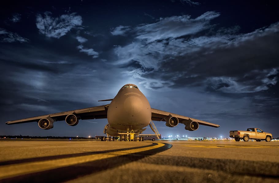 photo of airplane near pickup truck under blue sky, plane, aircraft, jet, airbase, airport, boeing c-17 globemaster iii, c-17, military transport aircraft, military, transport aircraft, boeing, united states, air force, usaf, mcdonnell douglas, base, sky, clouds, night, evening, stars, silhouette, military cargo aircraft, cargo aircraft, travel, HD wallpaper