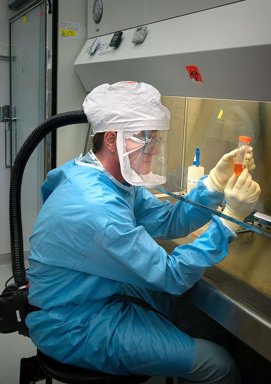man in blue overalls and beige gloves, microbiologist, scientist, pathologist, laboratory, searcher, caregivers, man, person, disease prevention, doctor, medicine, medical world, research center, isolation of bacteria, microbes, virus, oxygen, sterile room, protective equipment, mask, magnifying glasses, blouse, gloves, technology, health, science, treatment of disease, background, HD wallpaper