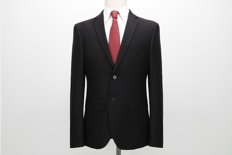 white-dress-shirt-red-necktie-and-black-suit-on-dress-form-suit